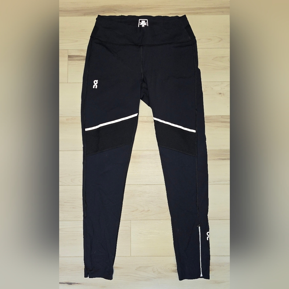 On Running Women's Black Tights with Reflective Details